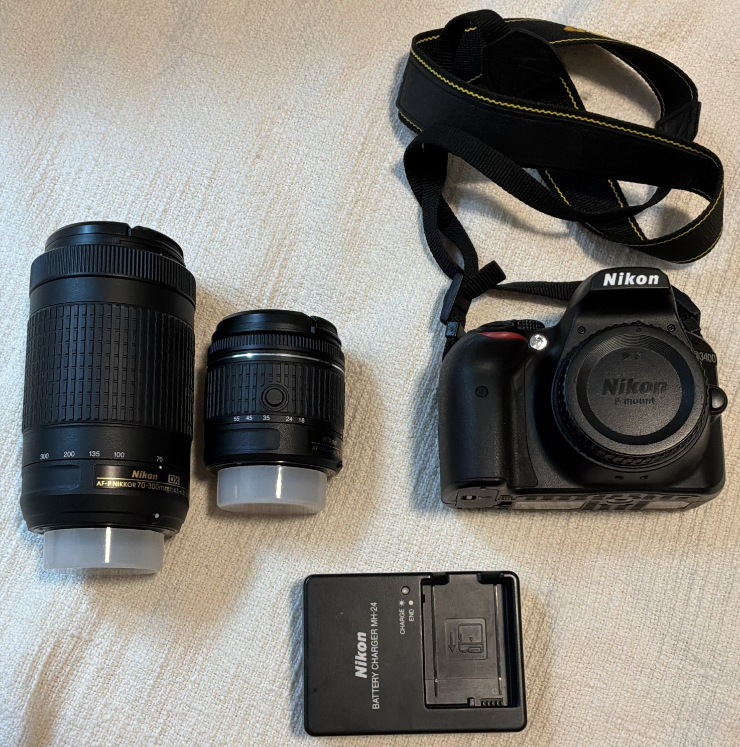 Nikon D3400 DSLR Bundle AF-P 18-55mm VR & 70-300mm Lens, MH-24, Bag