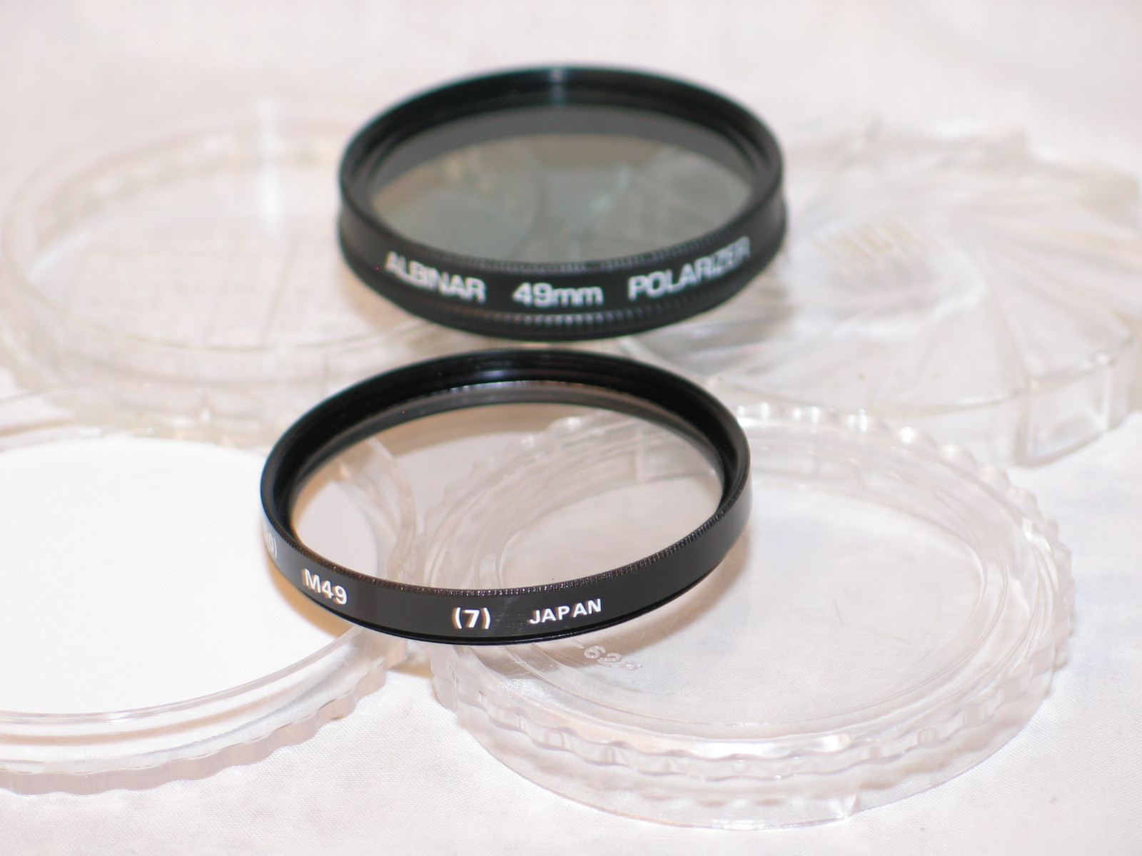 2 filters, 49mm POLARIZER & SKYLIGHT (1A) (LA+10) FILTERS W/CASES