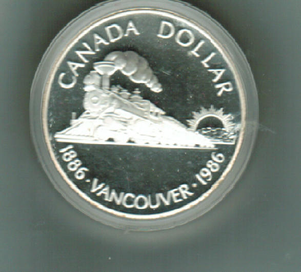 1986 PROOF SILVER DOLLAR, VANCOUVERS CENTENNIAL, IN CAPSULE  AND ORIGINAL CASE