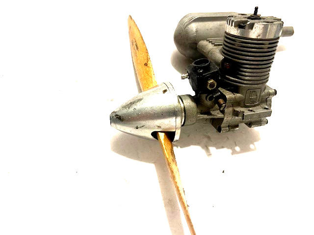 nitro airplane engine with propeller nose have a few scratches