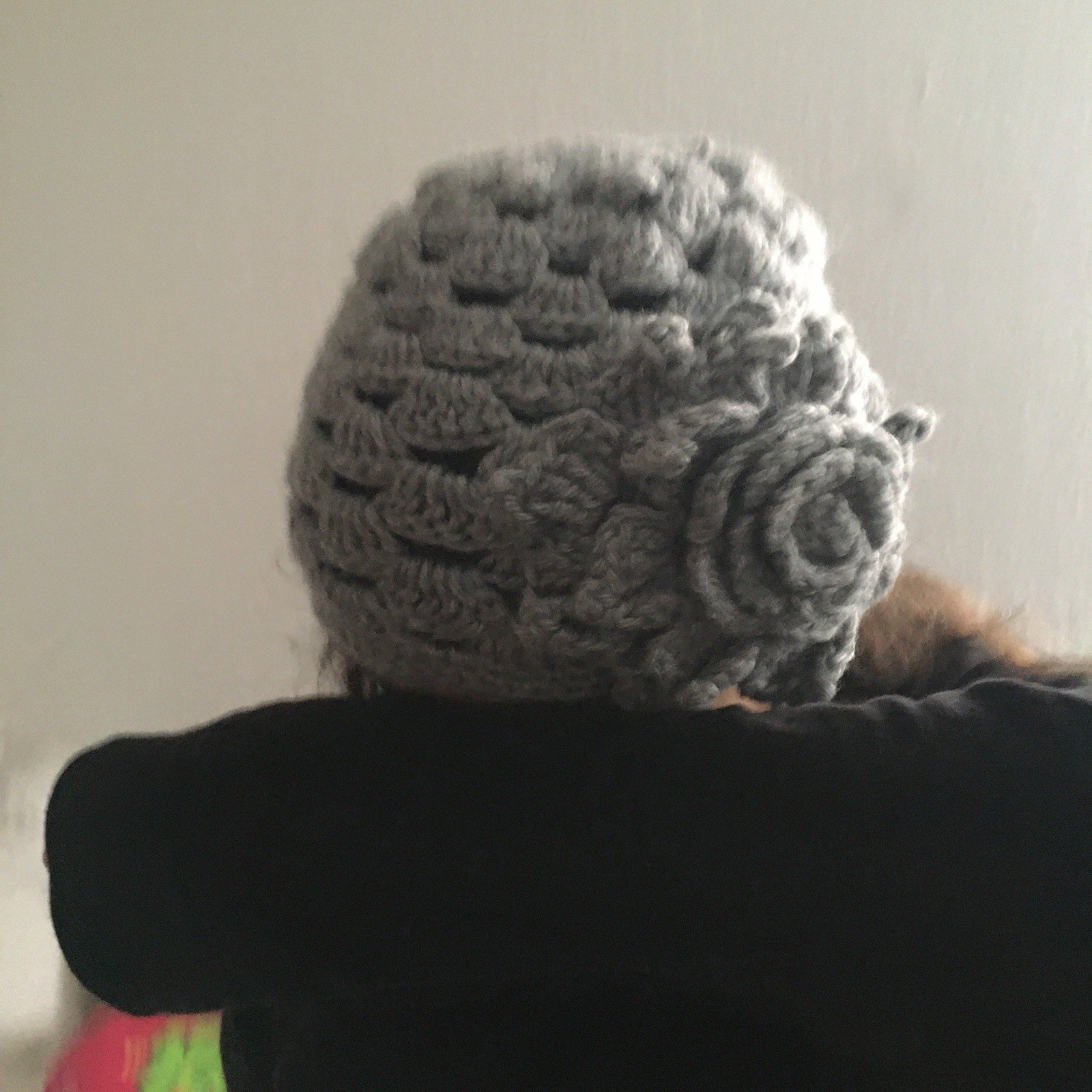 grey hand-crocheted hat suits all heads