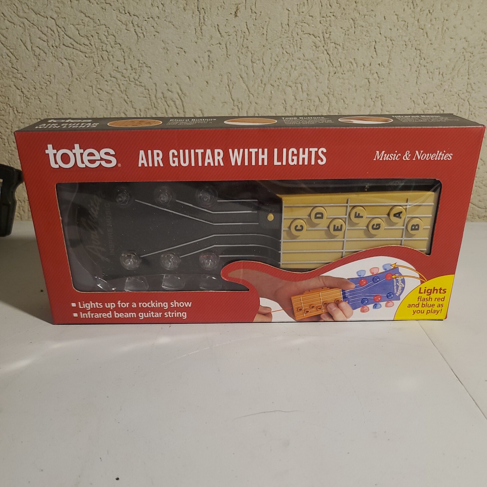 Totes Air Guitar with Lights - Lights flash . Infrared beam guitar string. NIB