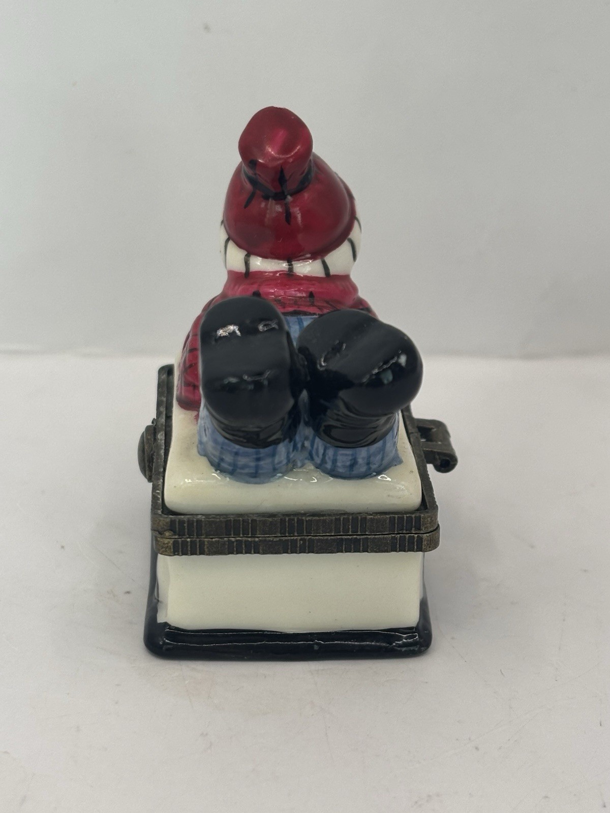Ceramic Boy On Sled Hinged Trinket Box 2.5”