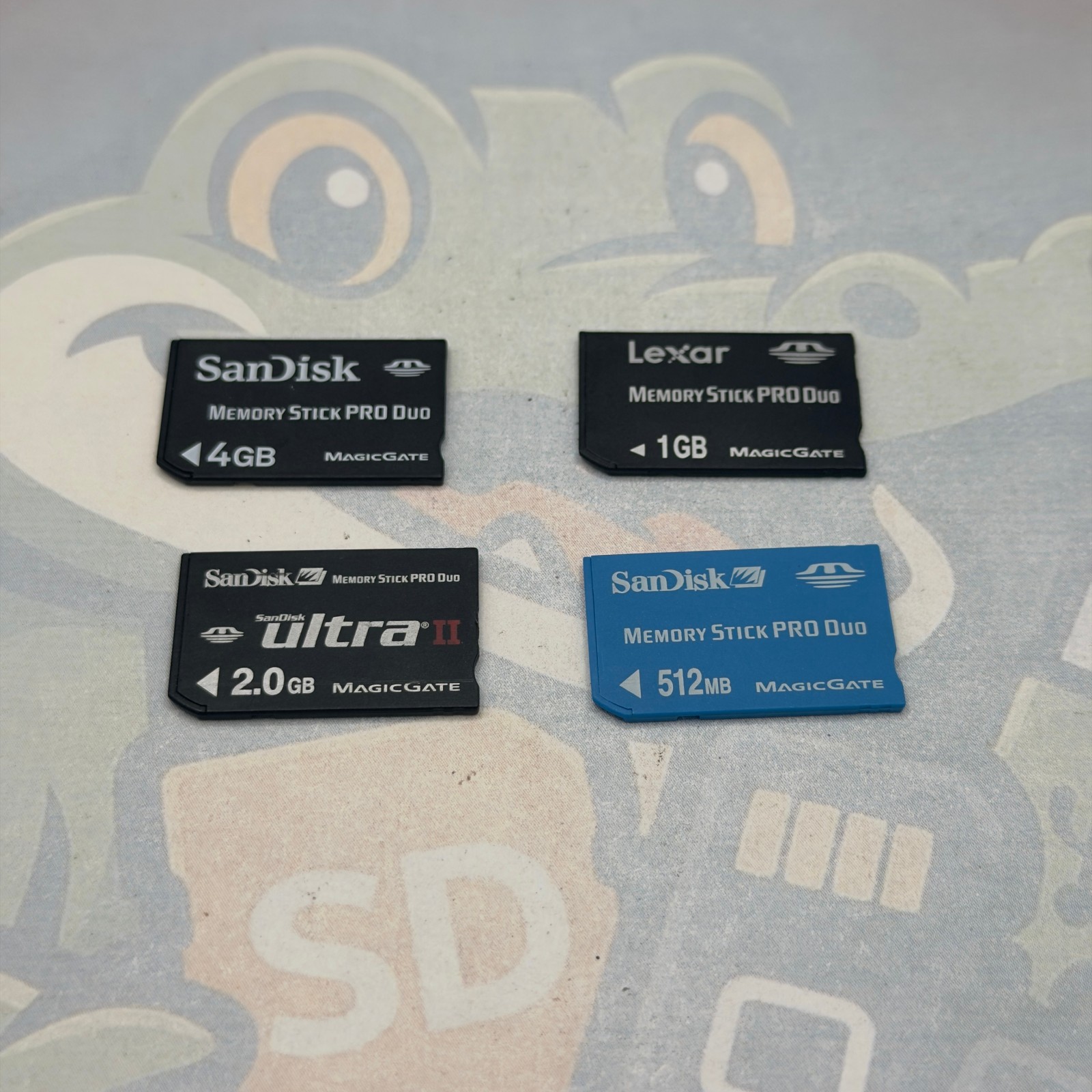 LOT of 4 MemoryStickDUO Cards - Various Sizes - Untested - Various Brands- GC943