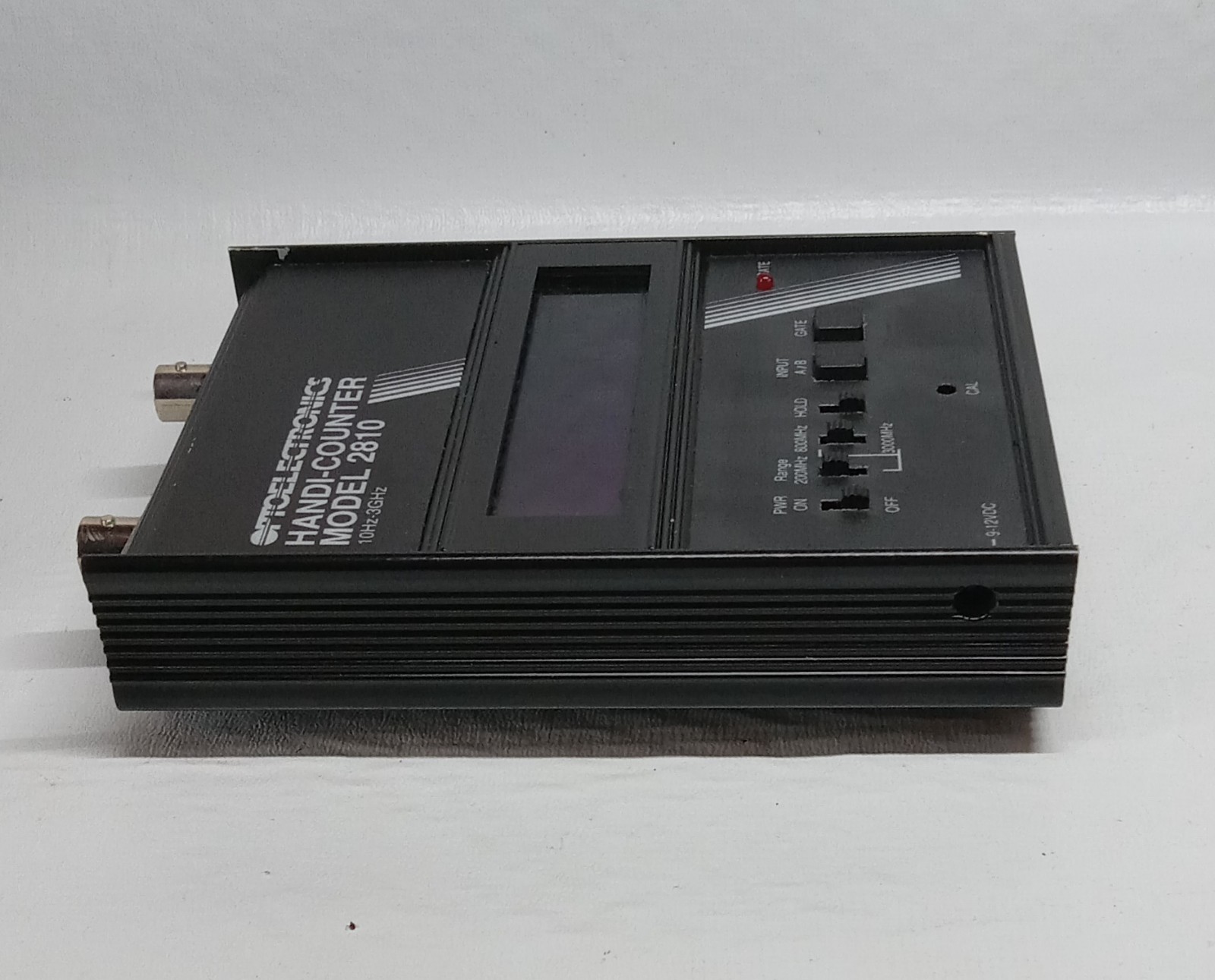Optoelectronics Handi-Counter Model 2810 Portable Frequency Counter with Manual