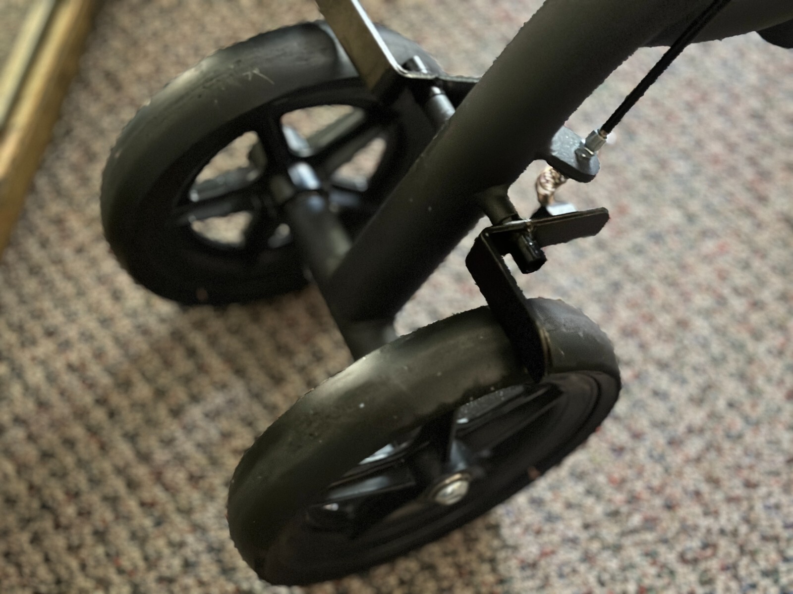 Black metal KneeRover mobility knee scooter