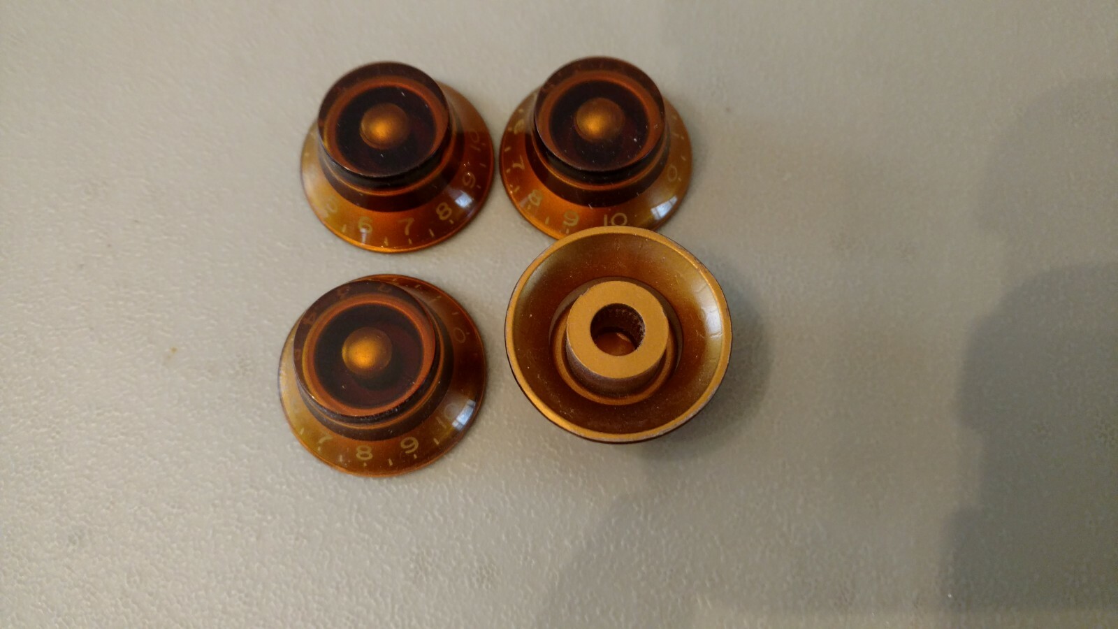 4 Amber Bell Knobs for IMPORT Guitars