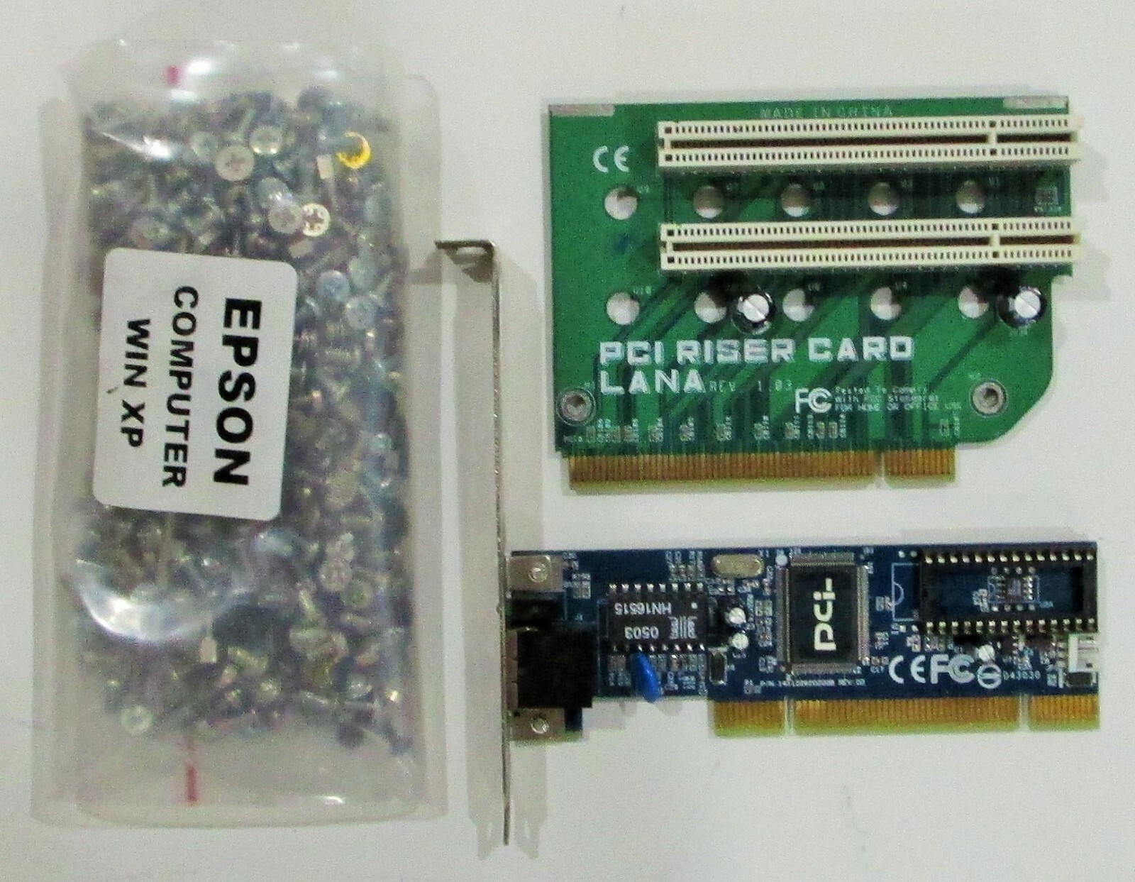 LAN card FNW-9803-T - PCI RISER CARD - plus assorted computer screws