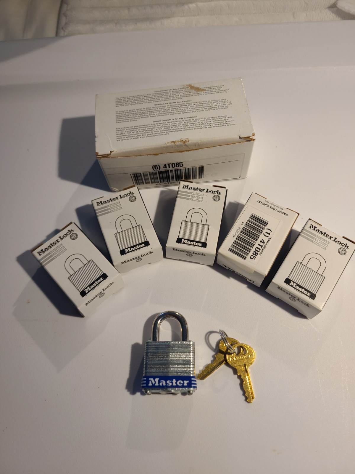 Lot of 6 Master Lock 4TO85, SKU: 6712. New, open box Padlock.