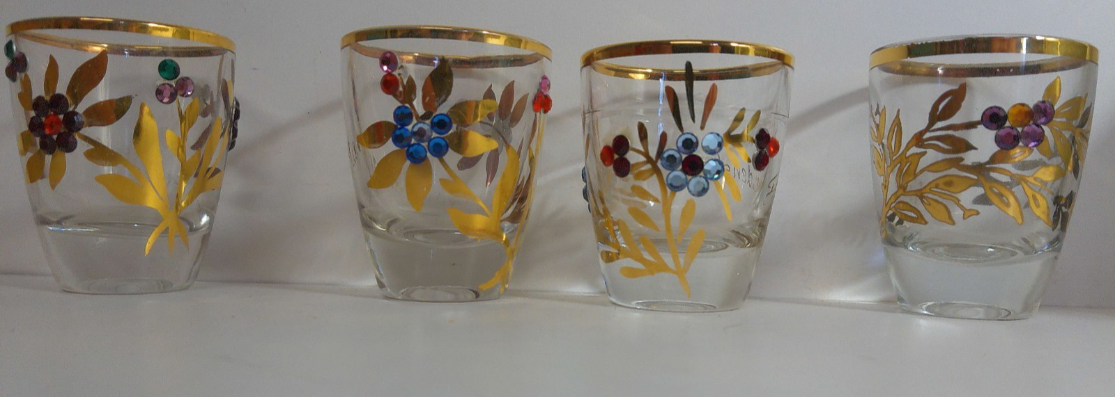 4 vintage German Souvenir shot glasses gold Gild rhinestone flowers Fruedenstadr