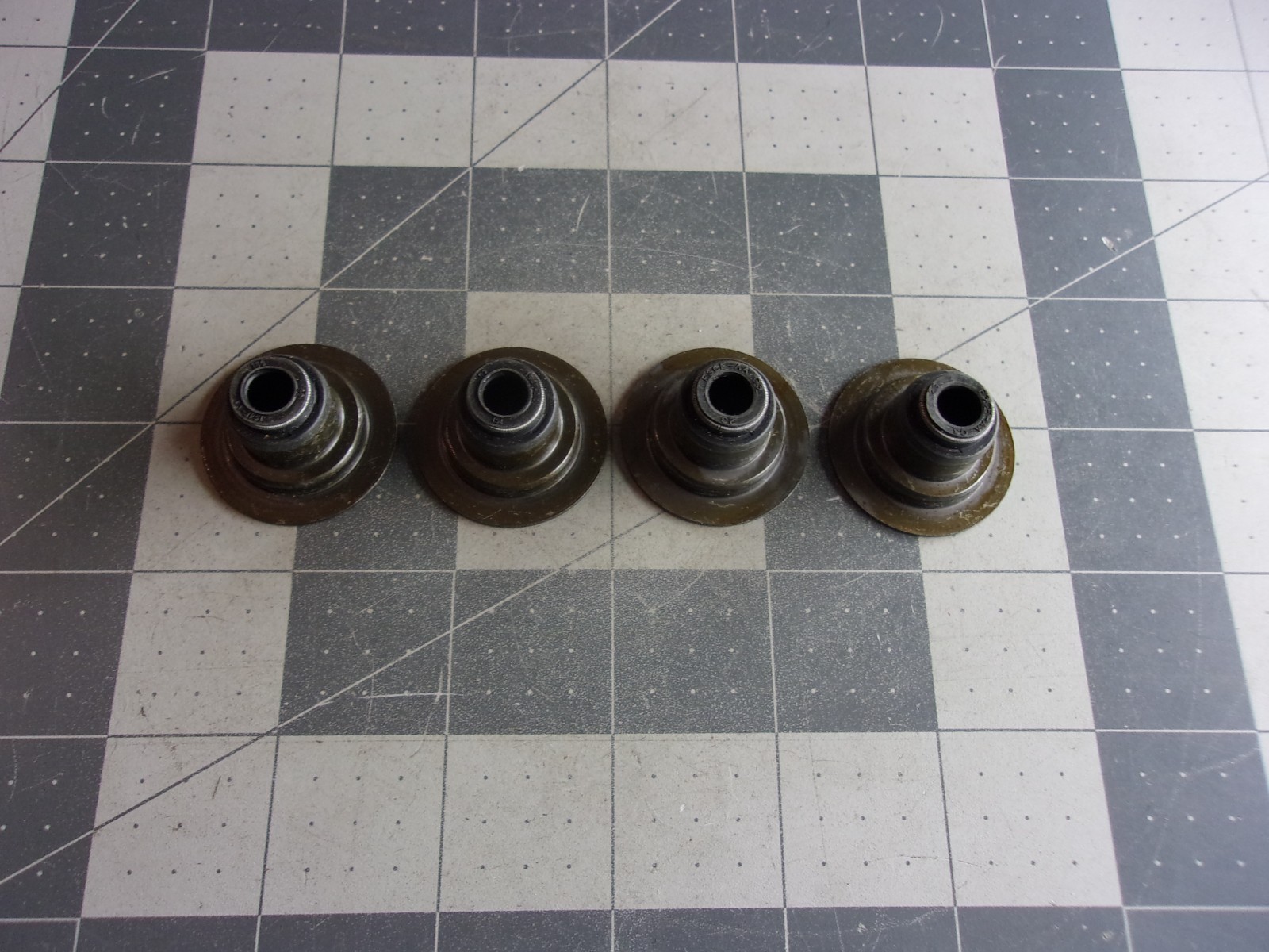 SBI 122-1206 (4) Valve Stem Seals E4FZ6571A '97-'02 Ford Escort L4 122CI 2.0L