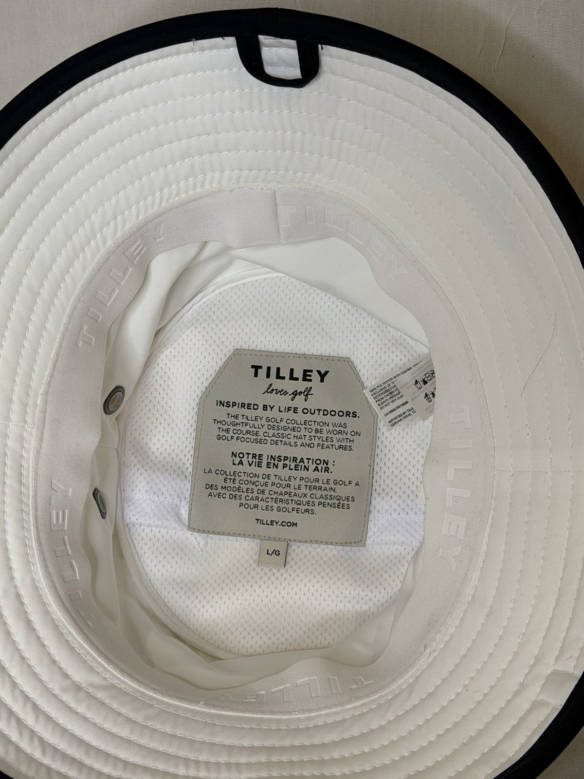 Tilley Wide Brim Adjustable Golf Bucket Hat White with Black Trim