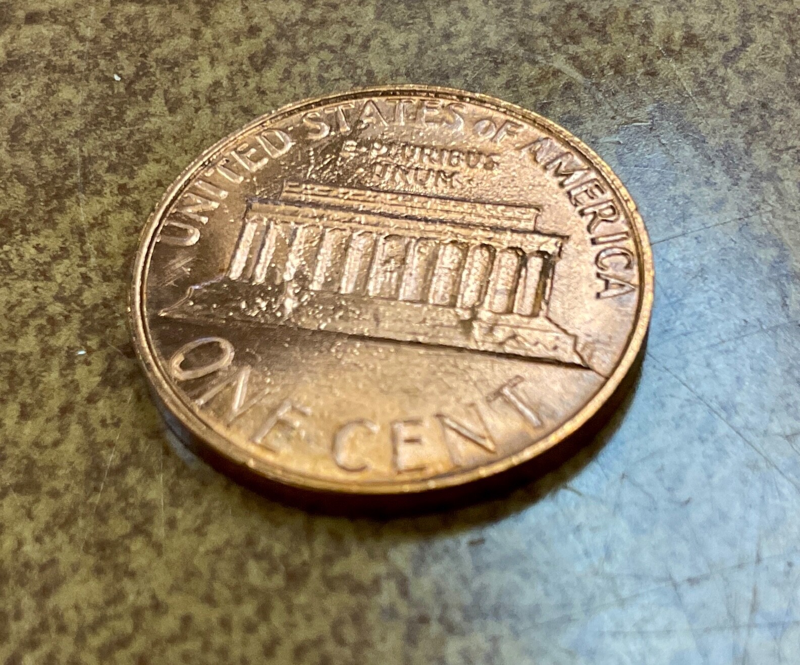 1983 Lincoln cent struck thru or die adjustment ERROR.