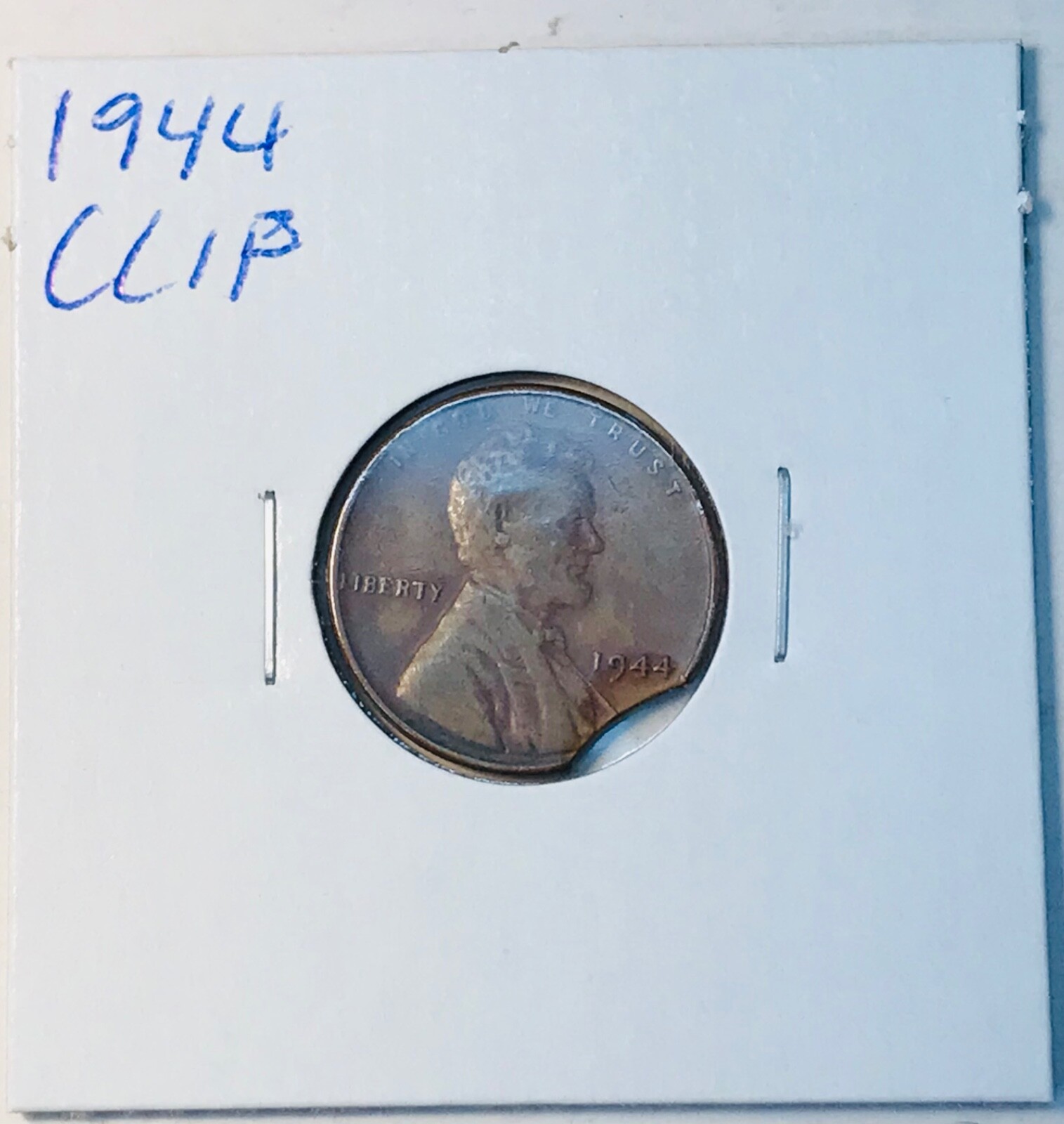 1944 Lincoln Wheat cent with curved clip
