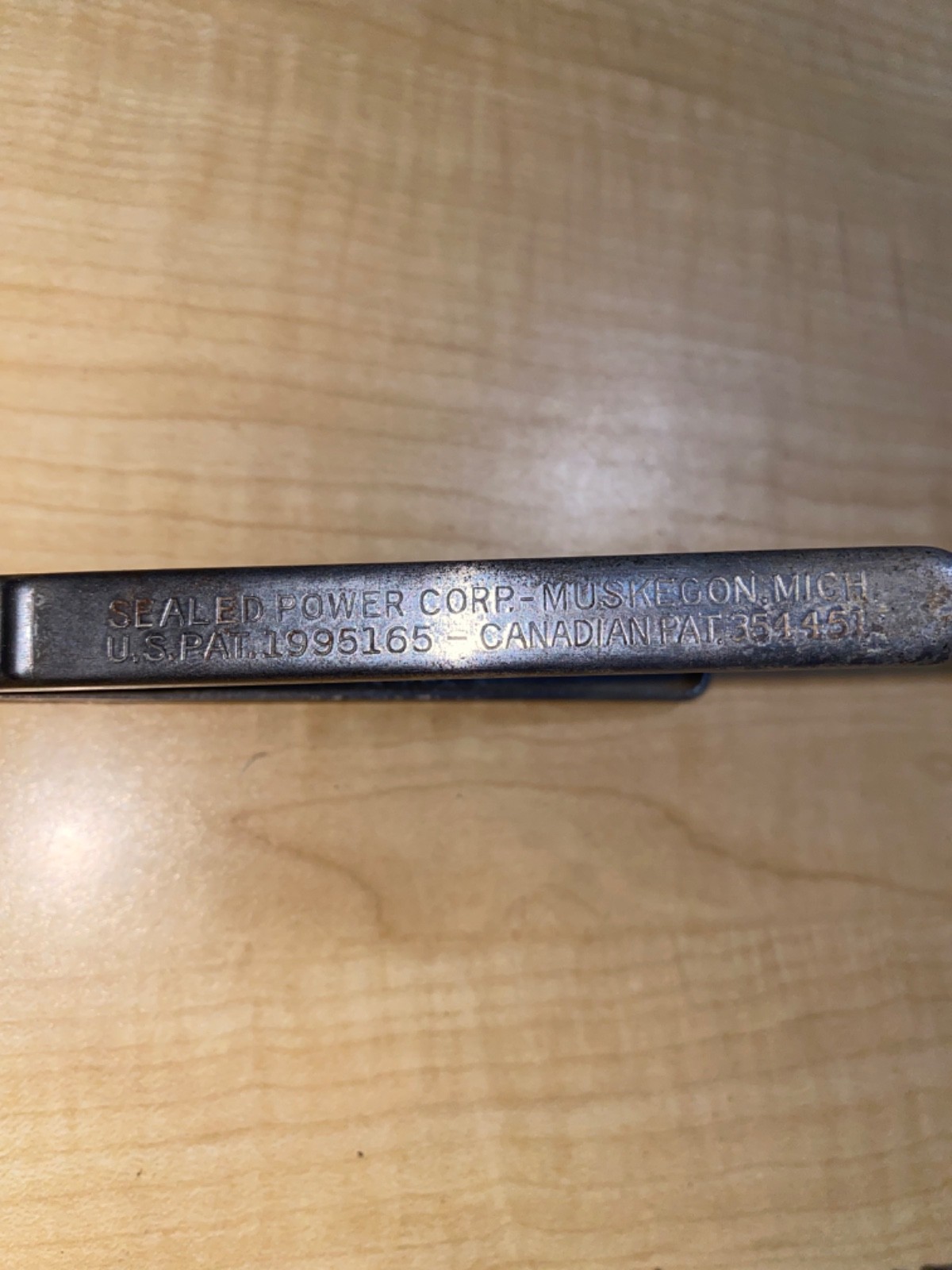 1935 year sealed power corp. piston ring expander