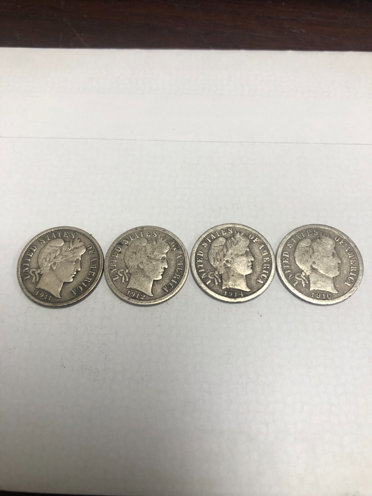 LOT OF FOUR BARBER SILVER DIMES - 1911, 1912, 1914 D, 1916