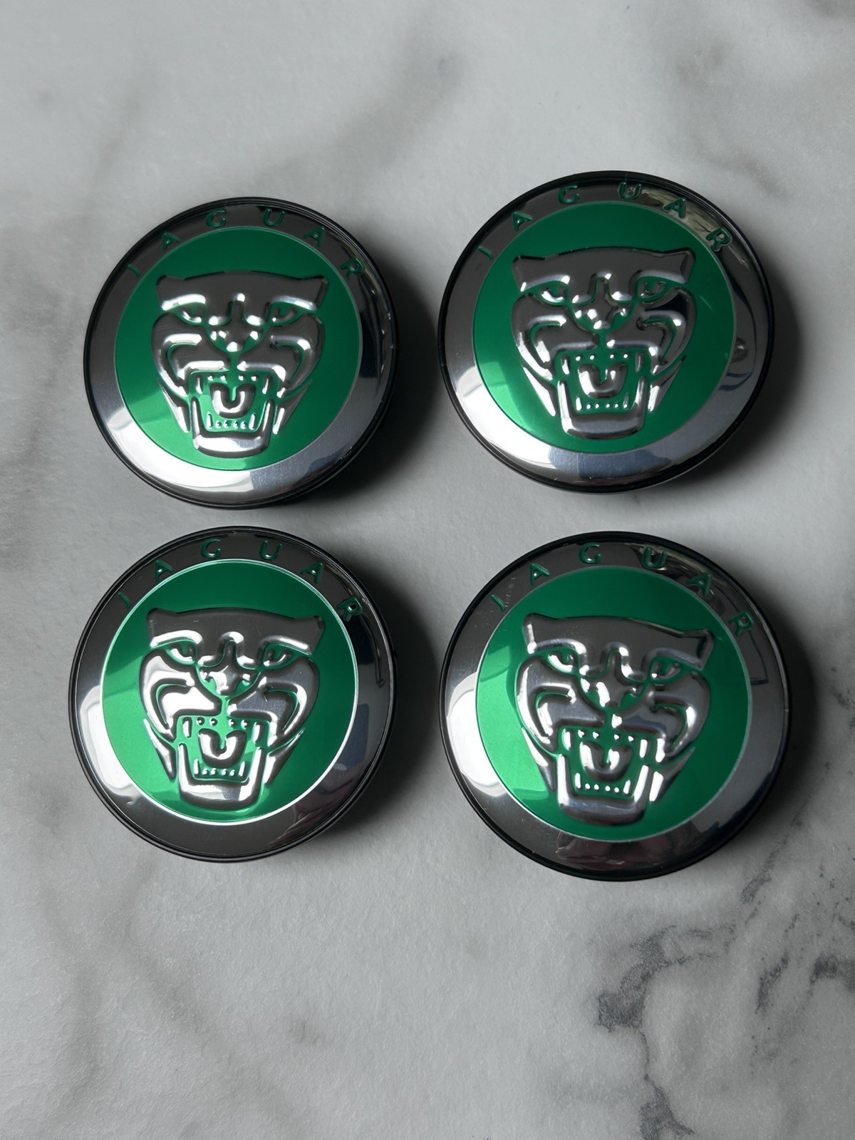 4 x 58mm chrome on Green centre caps will fit Jaguar alloy wheels brand new S5
