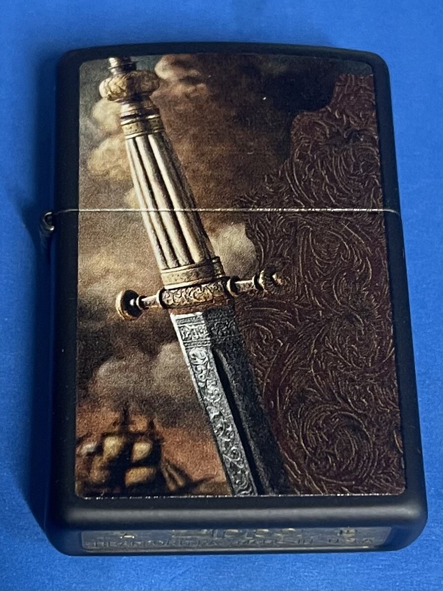ZIPPO 2012 SWORD OF WAR BLACK MATTE  LIGHTER UNFIRED IN BOX B715