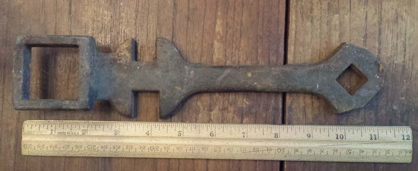 vintage cast iron unbranded Multi-Wrench - some damage