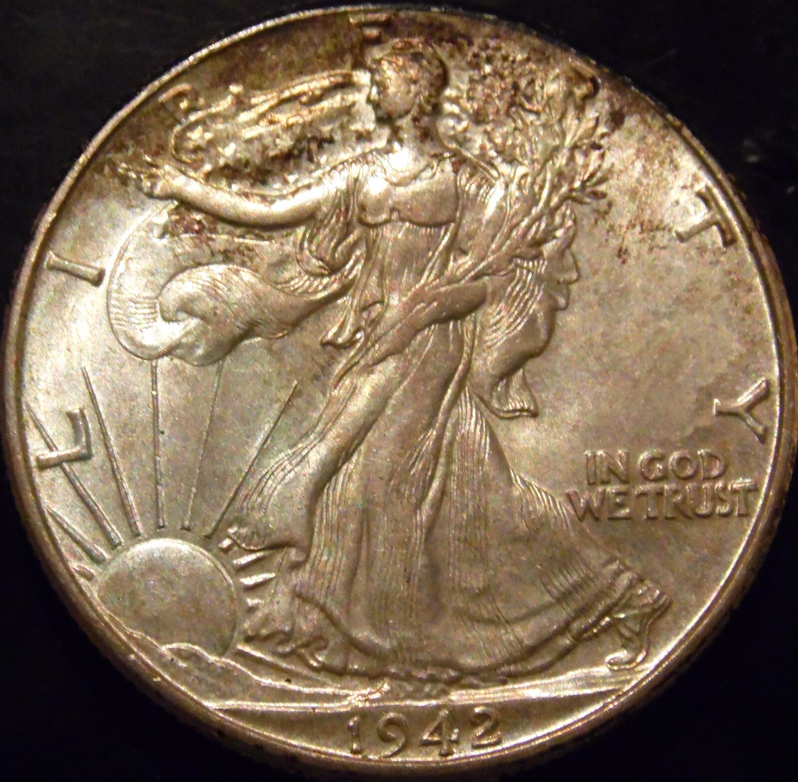 1942-P Walking Liberty Half Dollar Gem BU Light Rainbow Tone