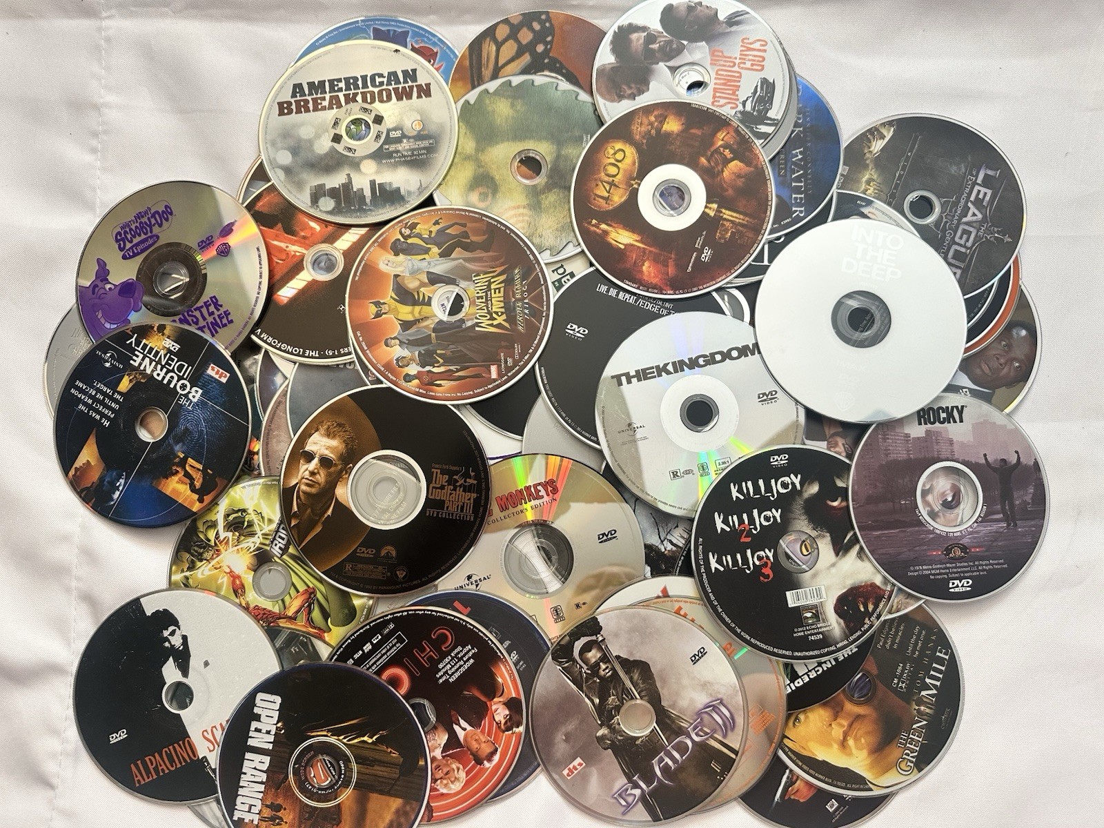 Wholesale DVD Lot of 100 Bulk Movies - Discs Only - Mixed Genres