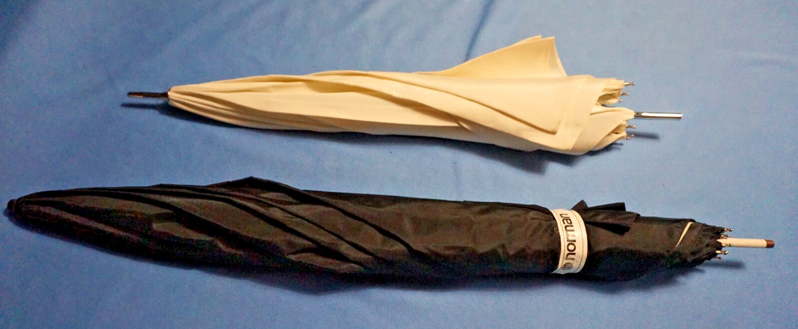 Two Studio Umbrellas, Norman Silver Reflector and White Reflective