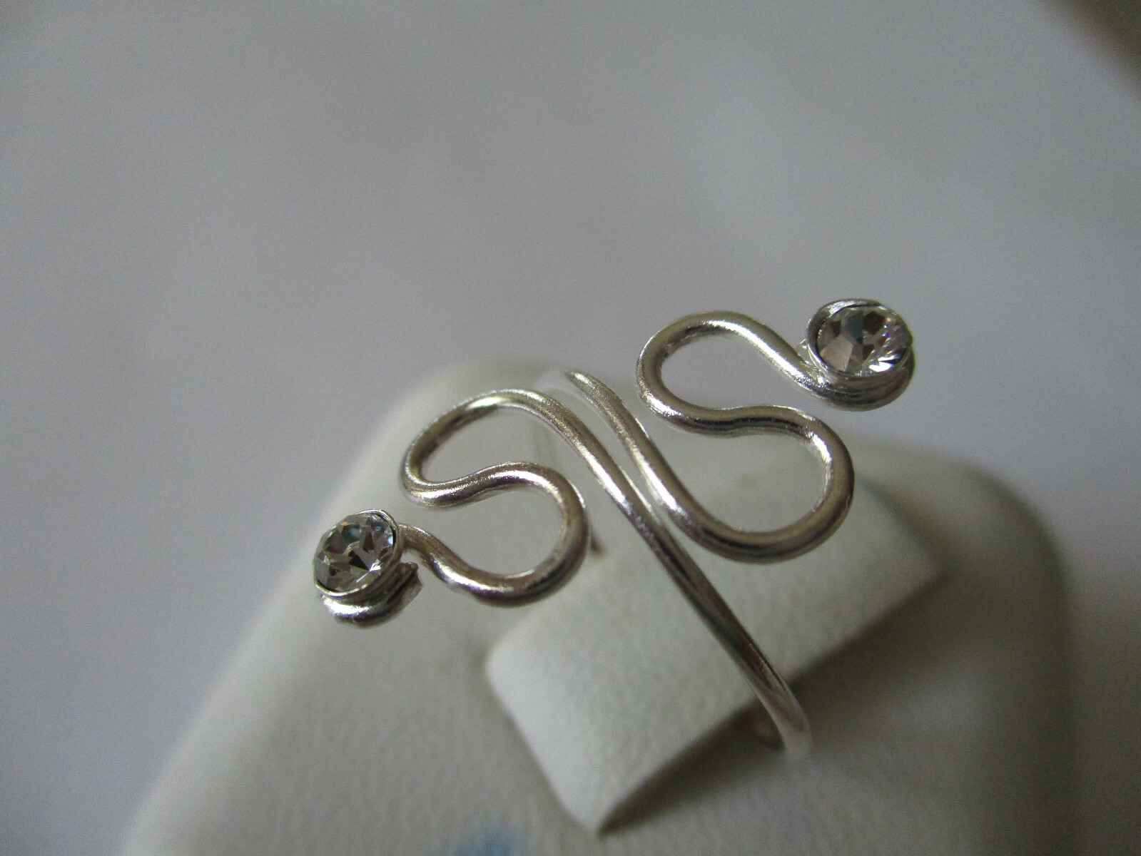 Sterling silver toe ring adjustable smooth double swirl with 2 round shiny CZ