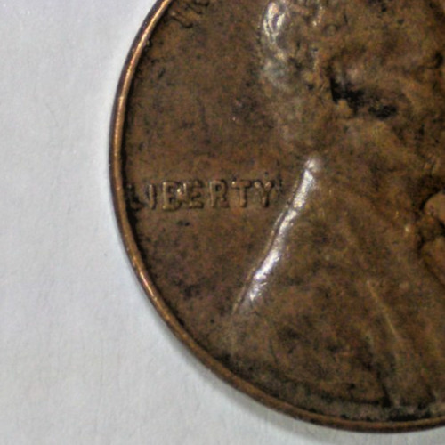 1956 MINT ERROR WHEAT CENT ('BIE' IN LIBERTY)