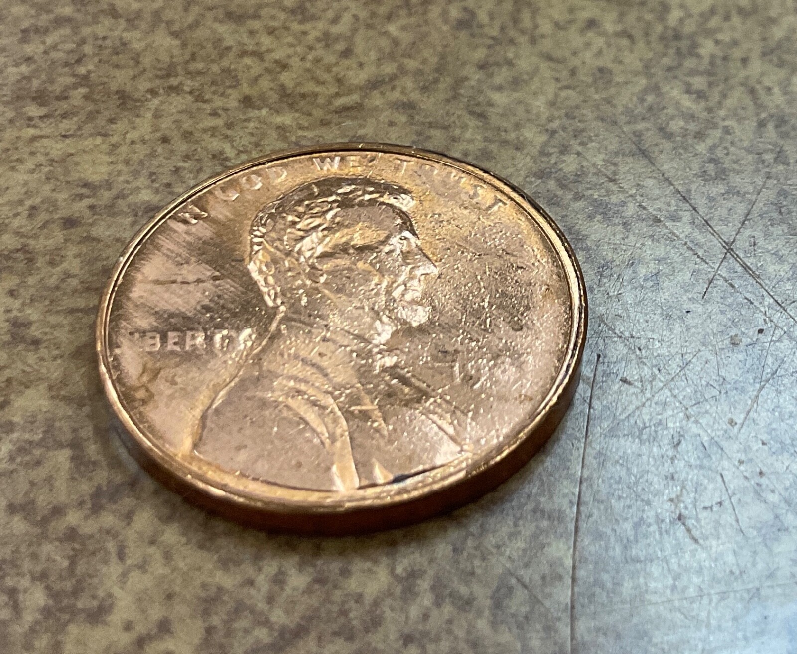 1983 Lincoln cent struck thru or die adjustment ERROR.