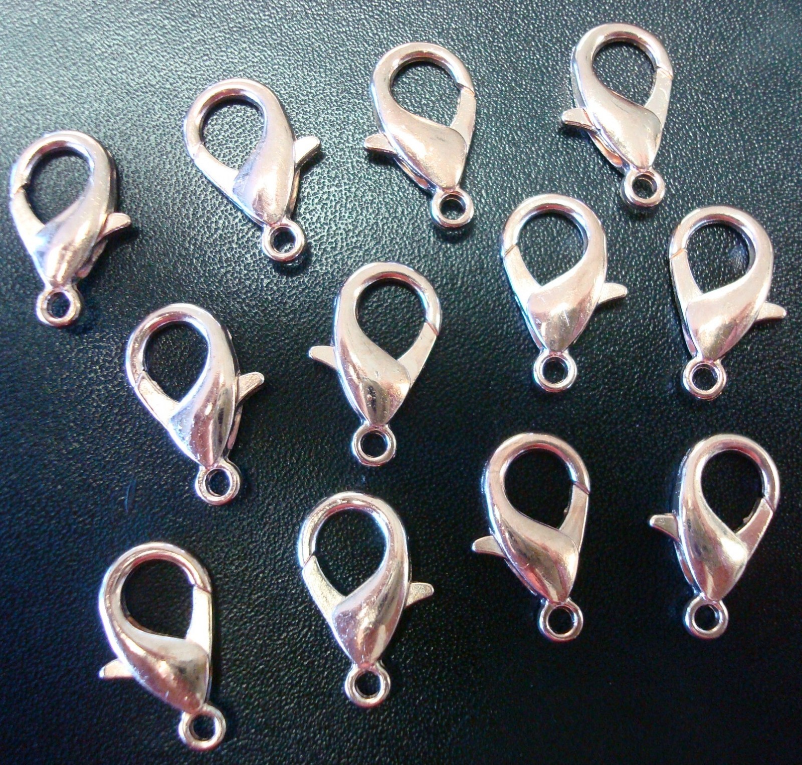 10 Lt. Rose gold plated metal lobster claw parrot trigger clasps 16mm fpc380