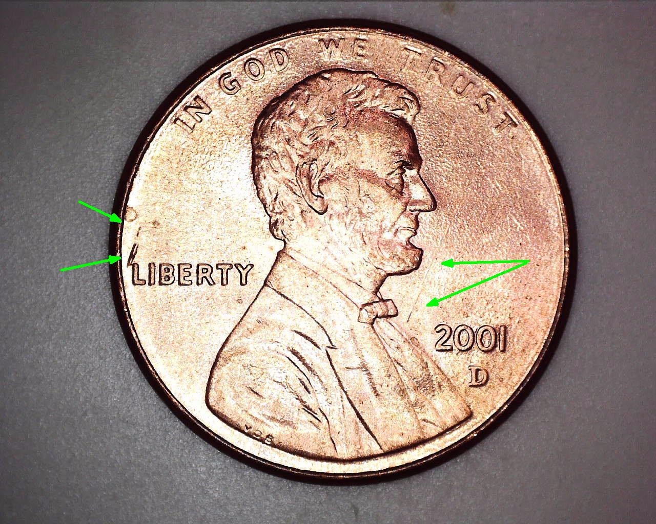 2001 Denver Lincoln Penny - Die Chips above Liberty, by Lincoln's Tie