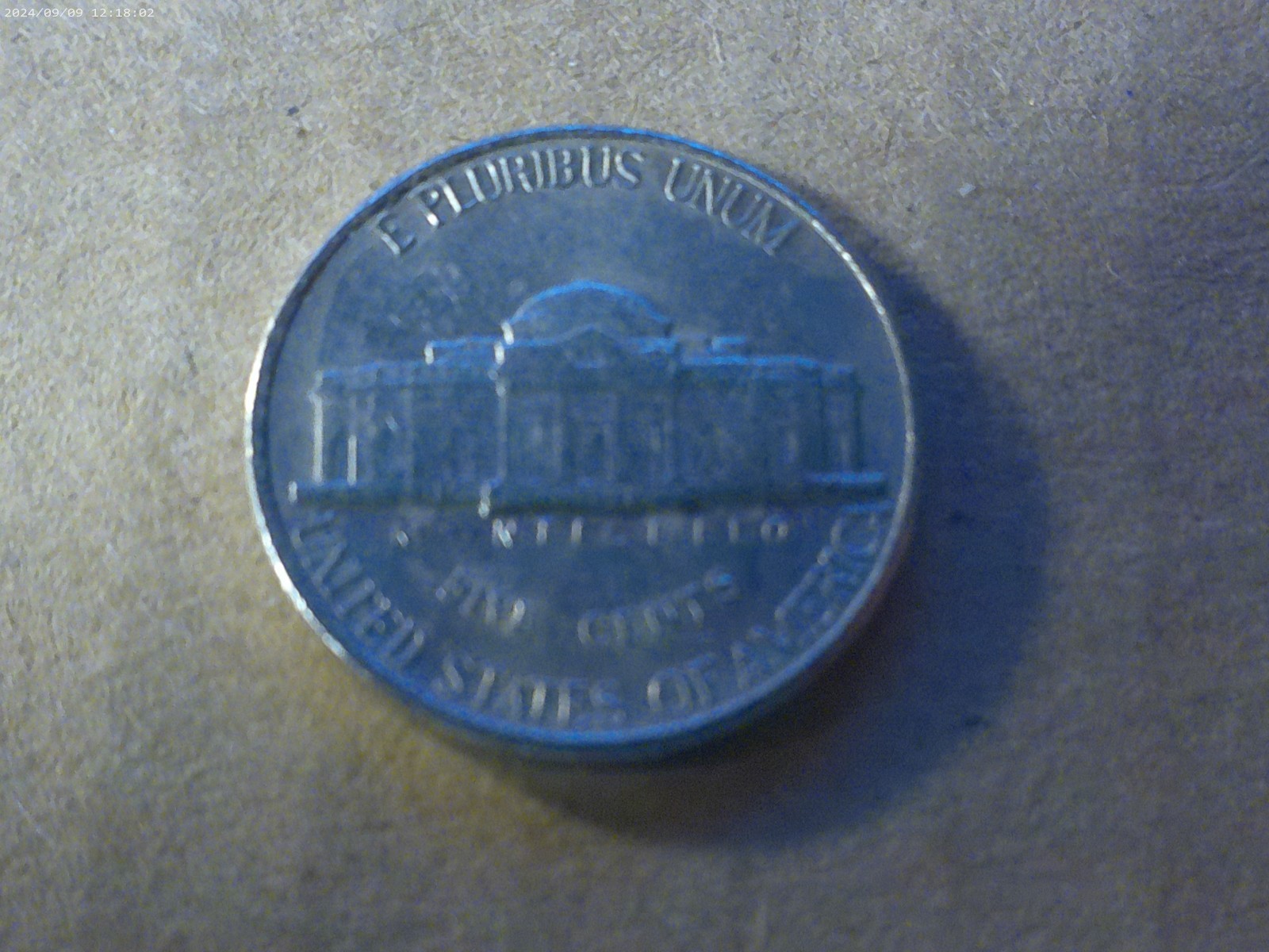 1996-P Jefferson Nickel Strike Through On the Reverse