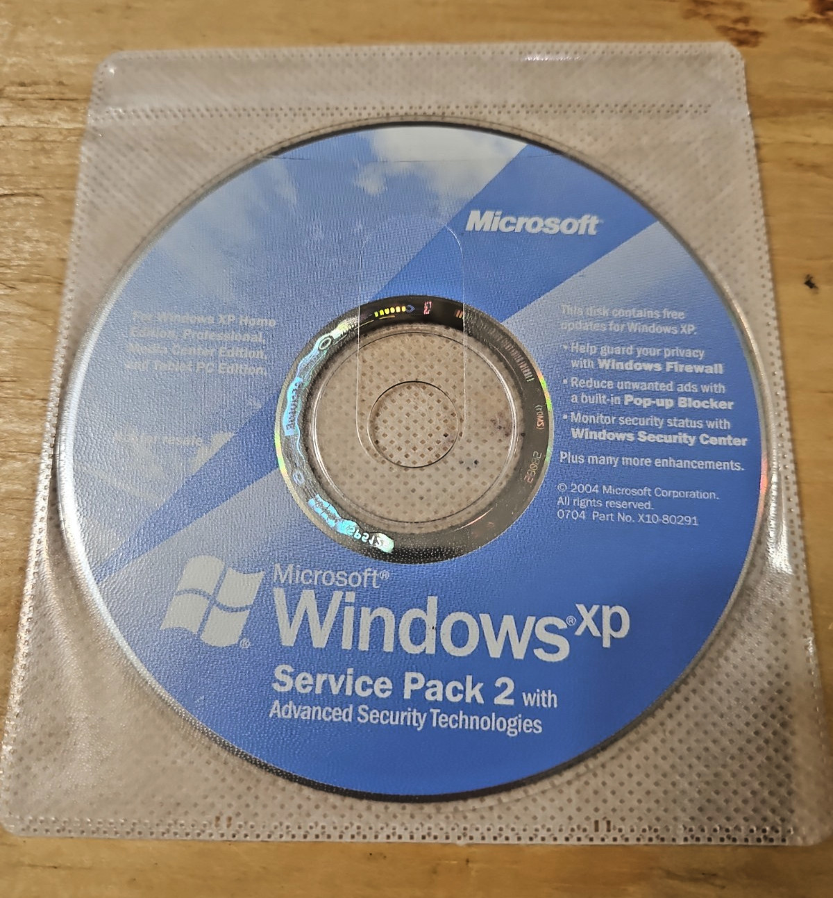 Microsoft Windows XP Service Pack 2 with Advanced Security Technologies disc cd
