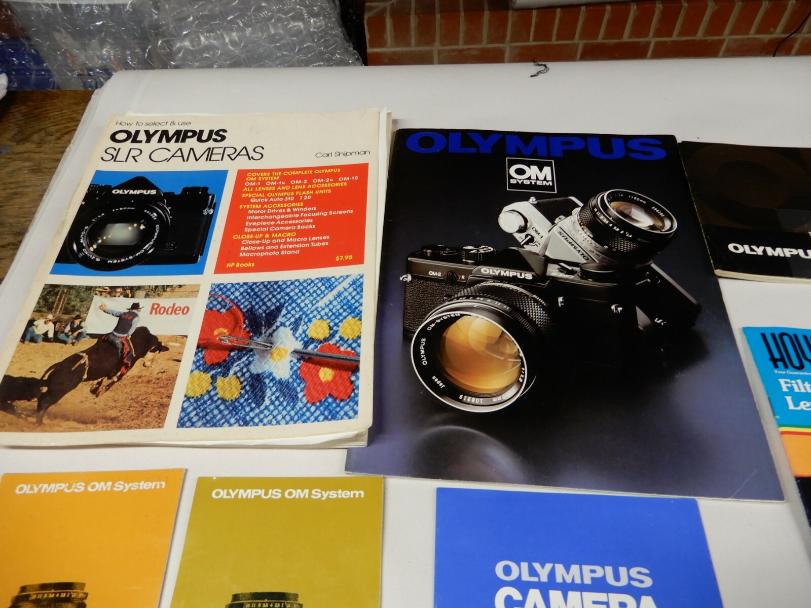 Olymous OM-2 Manual and Many Awesome OM System Sales Brochures