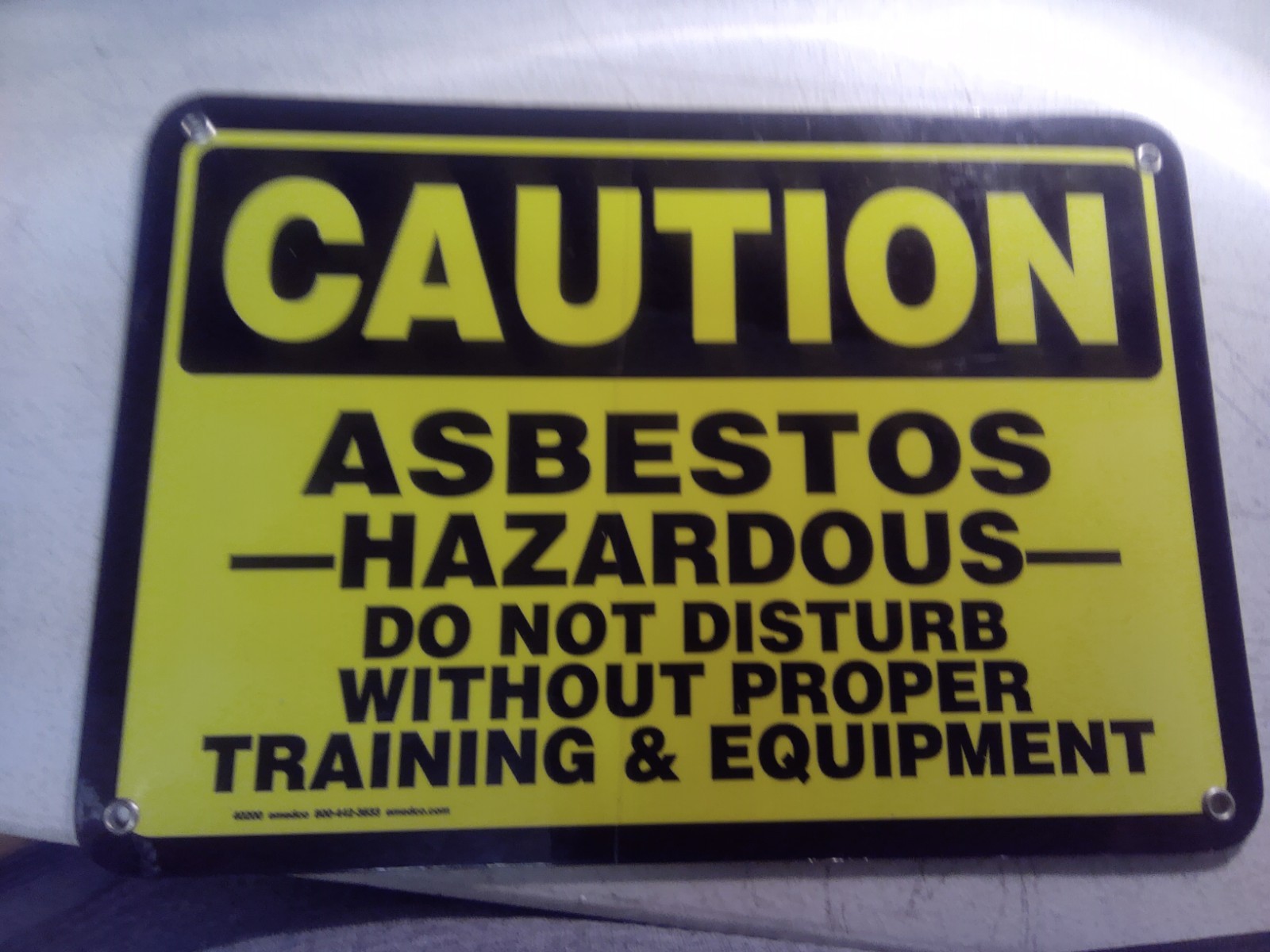 Caution Asbestos Hazardous