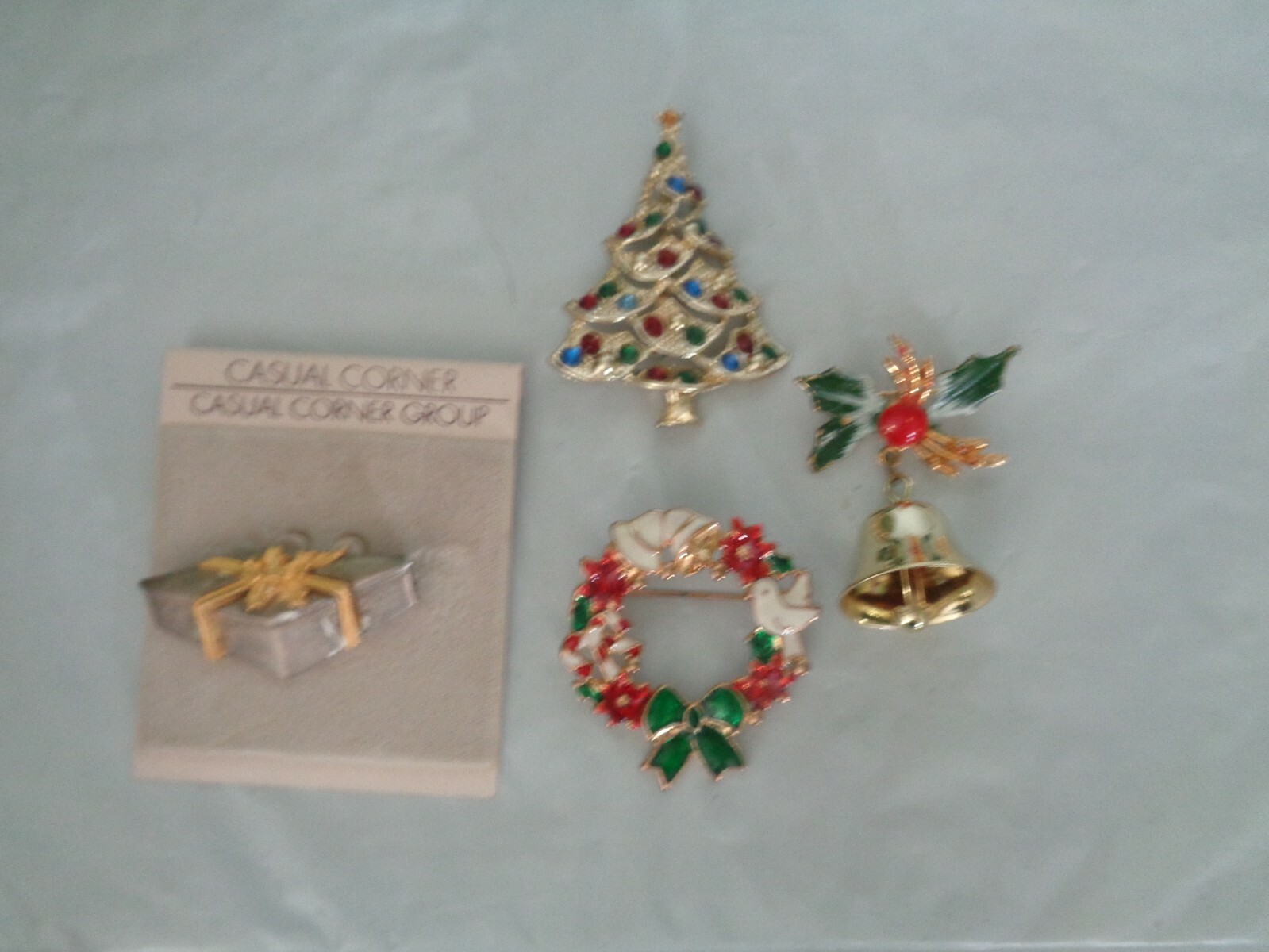 Lot of (4) Christmas Brooch / Lapel / Hat Pins - Wreath - Tree - Gift - Bell