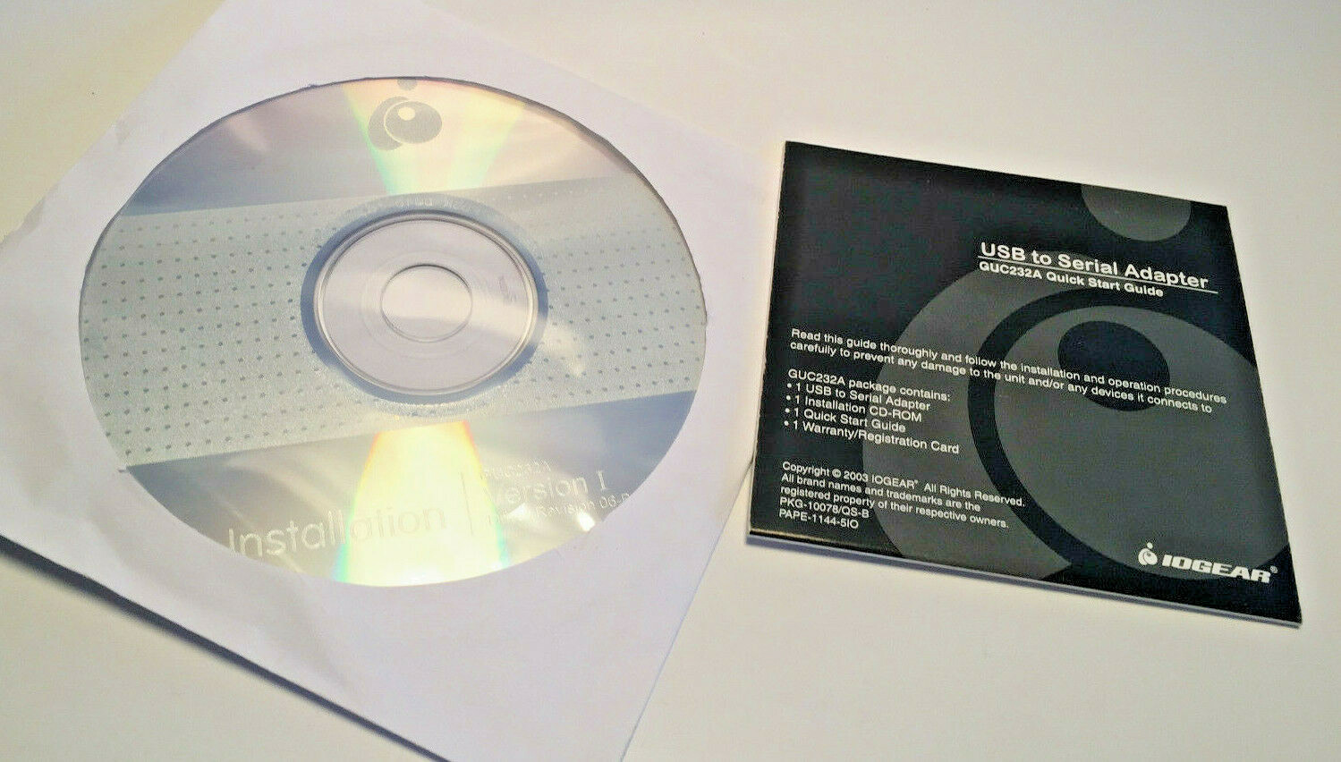 IOGEAR USB to Serial adapter installation CD with GUC232A quick start guide