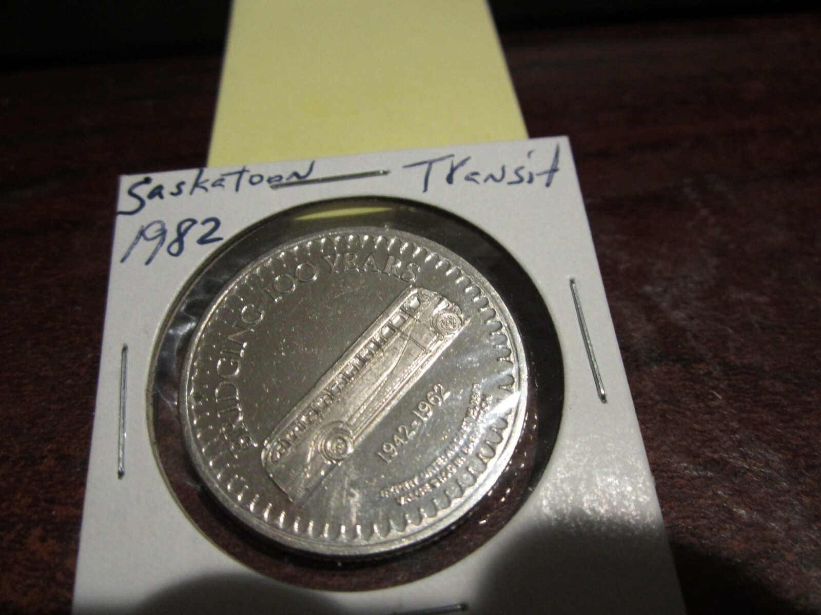 1982 - 100 years Bus, Saskatoon, SK - Canada Commemorative Trade Dollar