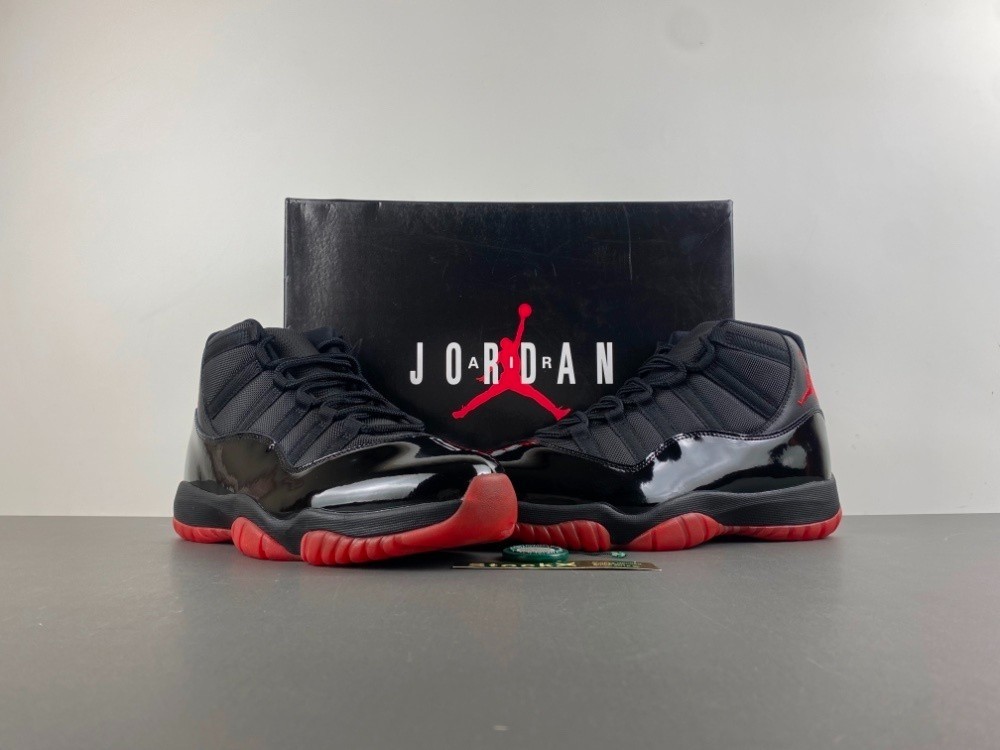 Jordan 11 Black and Red Size US (7-12)