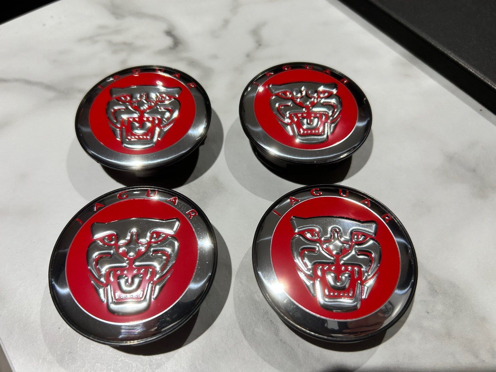4 x 58mm chrome on Red centre caps will fit Jaguar alloy wheels brand new S5