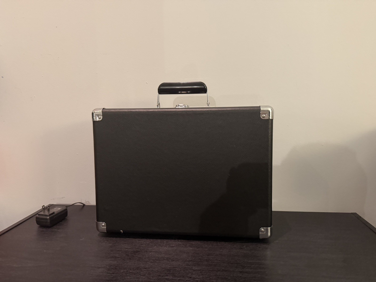 Crosley Record Player Red Suede doubles as a black leather briefcase