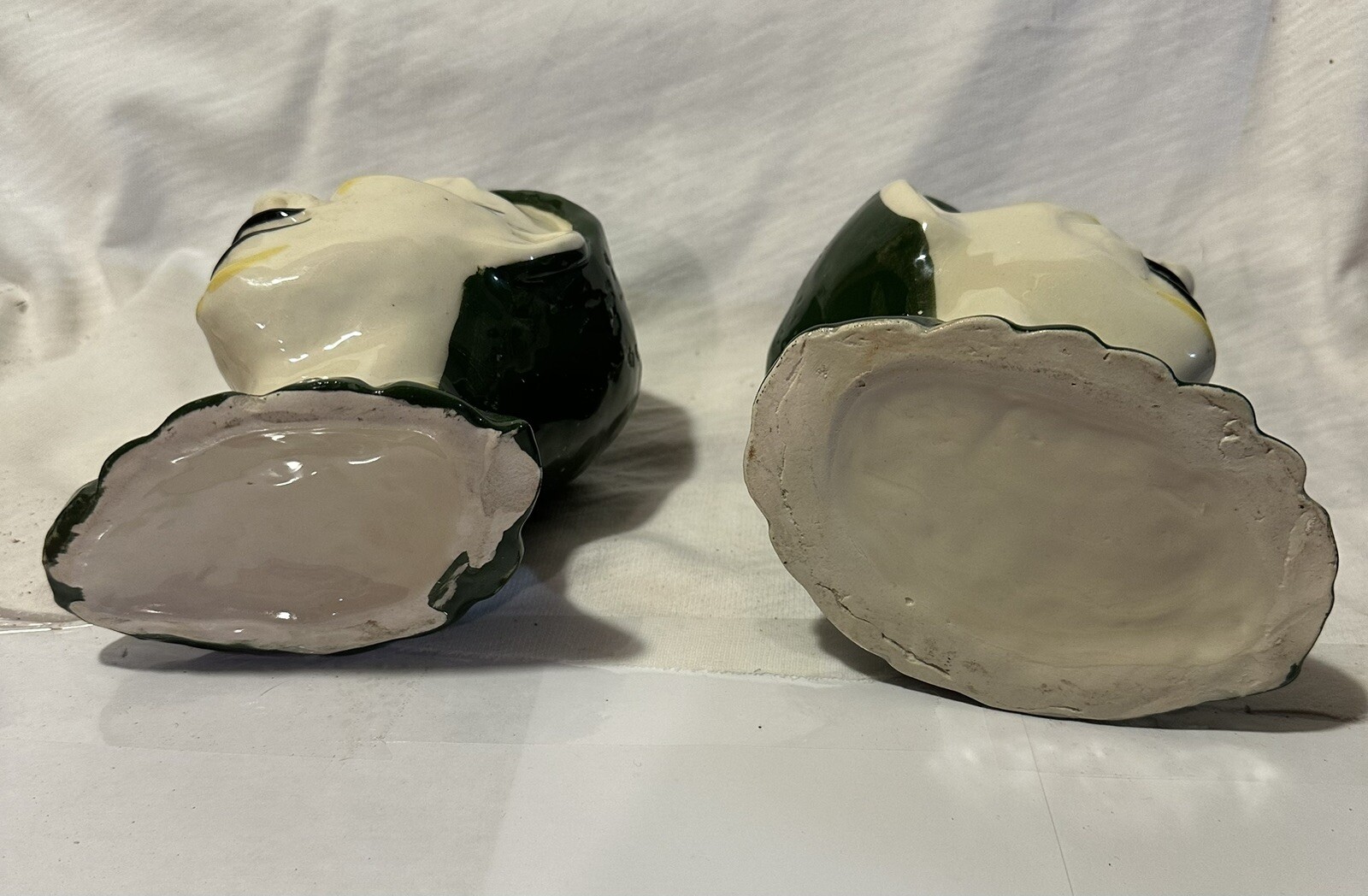 2 ceramic Jester planters.