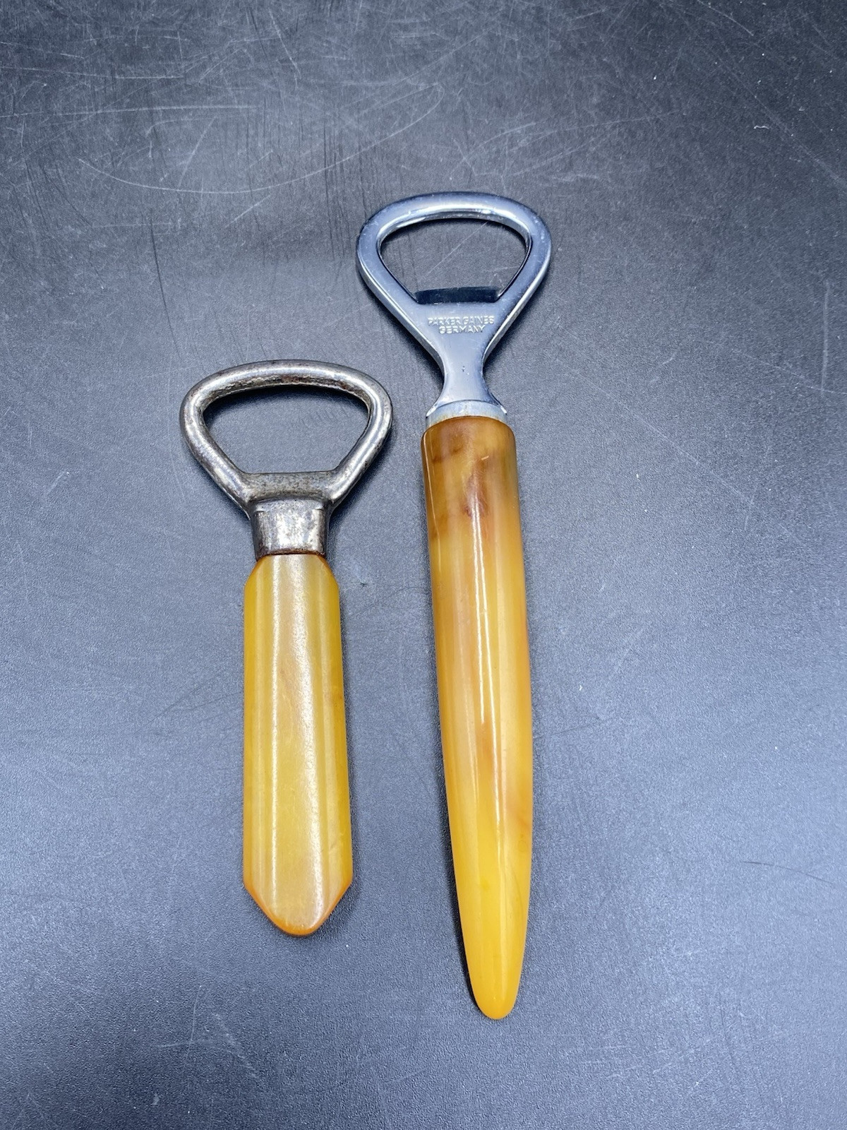 2 BUTTERSCOTCH BAKELITE BOTTLE OPENERS PARKER GAINES GERMANY