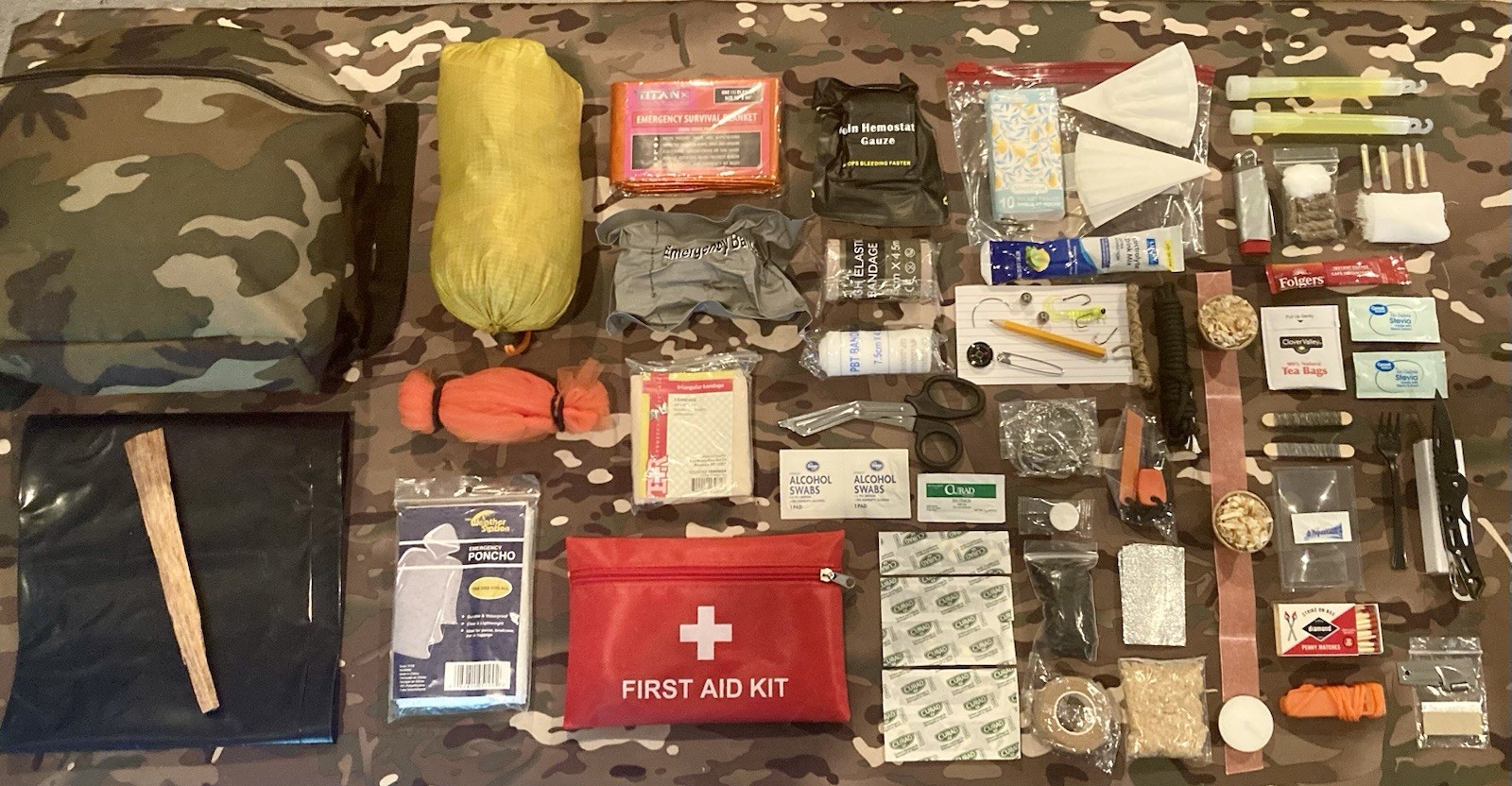 128 Piece Emergency Outdoor Survival Kit with camo buttpack