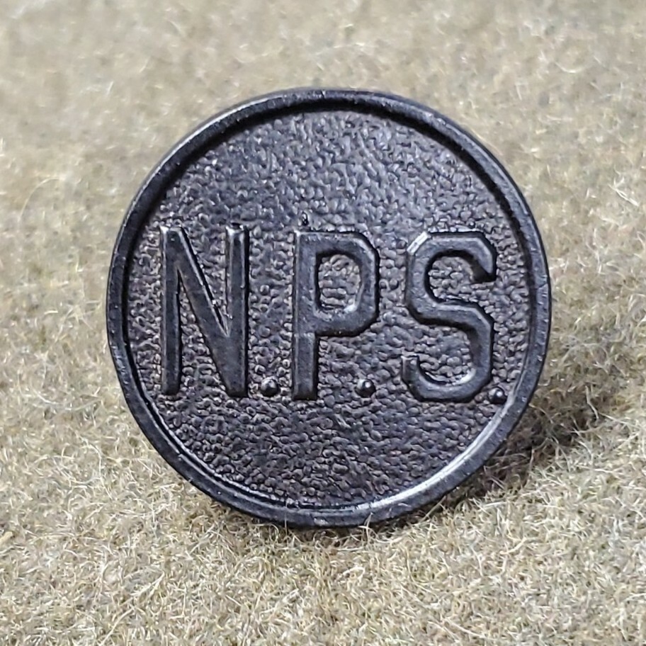 N.P.S., National Park Service Corps Collar Disk