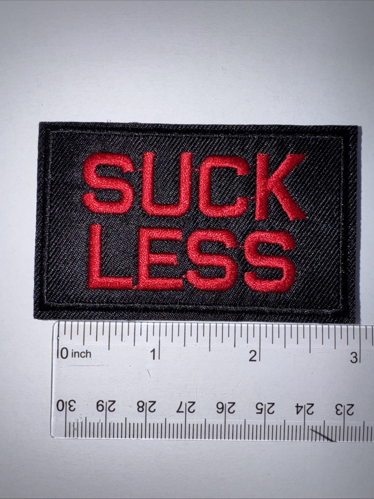 SUCK LESS Morale Patch Hook and Loop Patch
