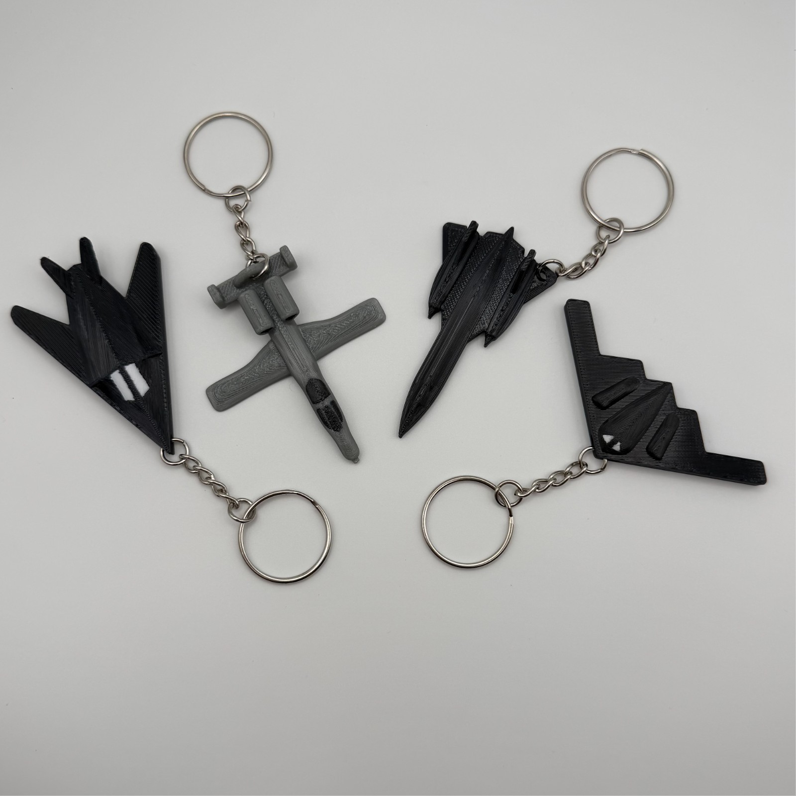 Flexible Military Jet Keychains (4-Pack) A-10, SR-71 Blackbird, F-117, B2 Bomber