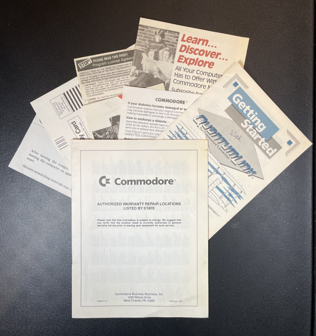 Vintage Commodore Warranty Cards, Service Stations, and Q-Link Phone DIrectory