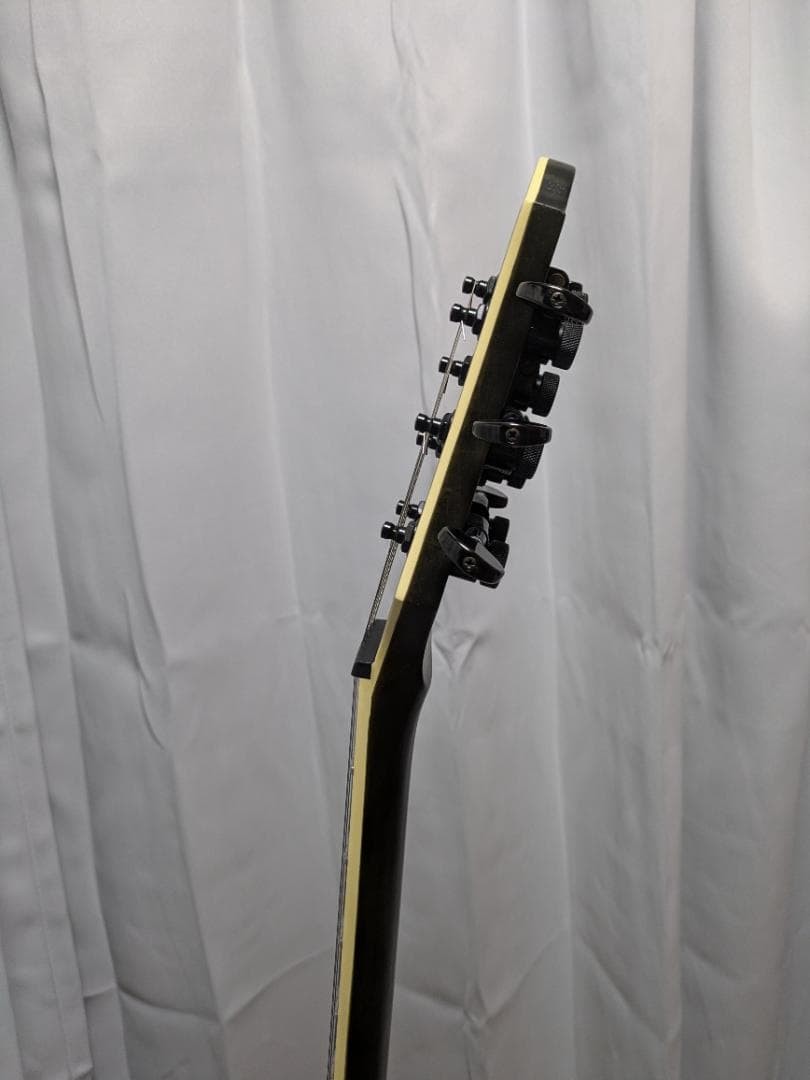 Schecter C-7 Sls Elite Evil Twin 7