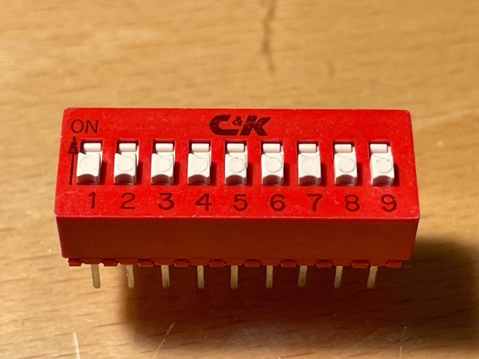 Switch DIP ON OFF SPST 8 Raised Rocker 0.15A 30VDC PC Pins by C&K.